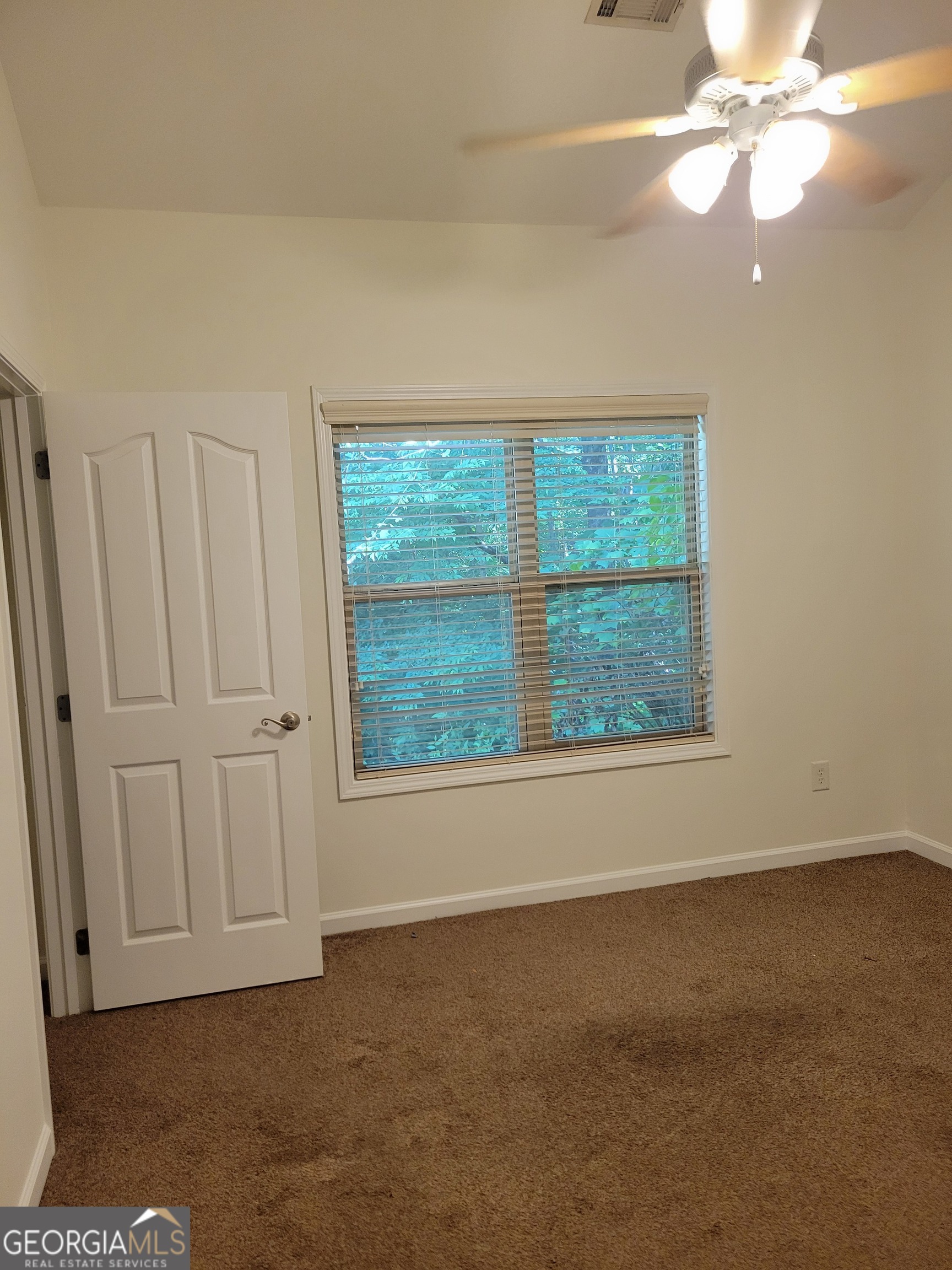 175 Spinner Drive Jefferson, GA 30549 - Photo 24 of 34 a view of an empty room with a window