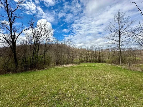 a room with gym equipment and a window