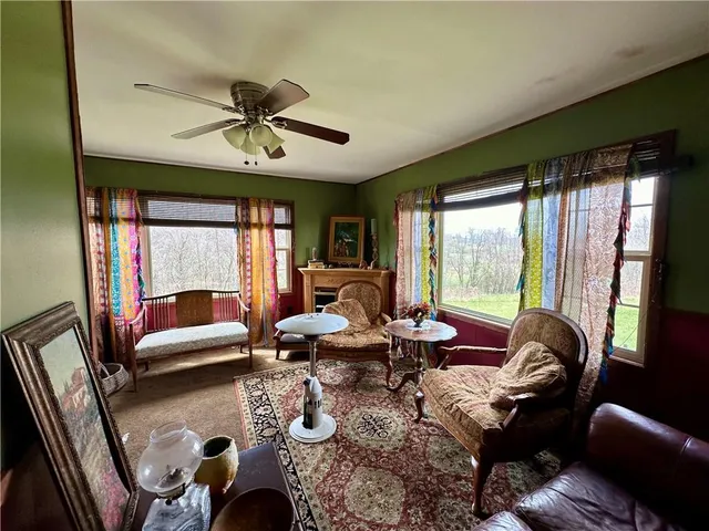 a bed room with furniture and a window