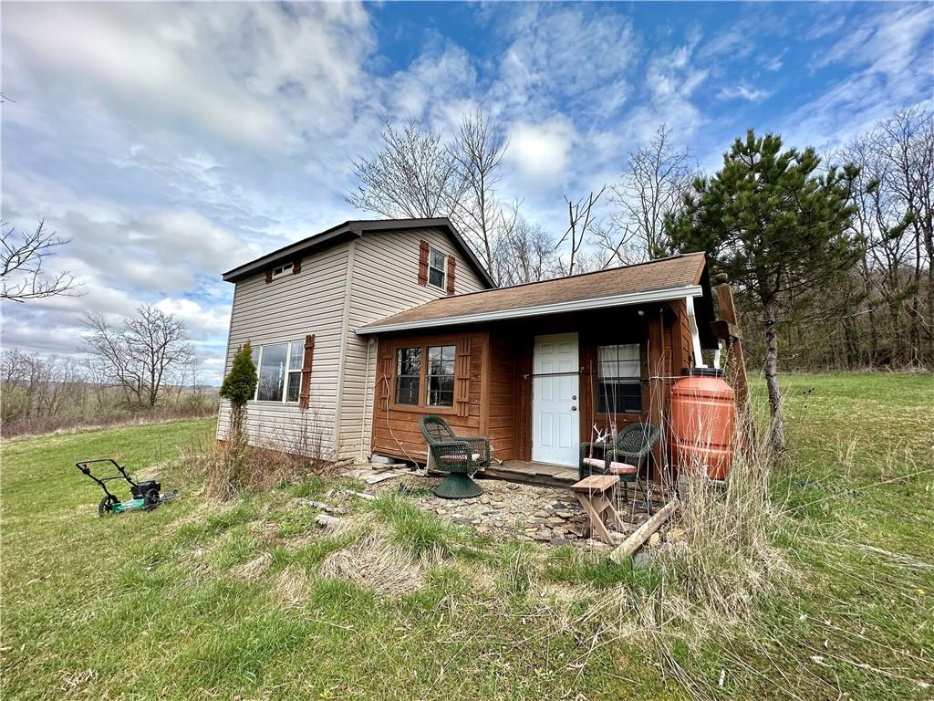0 Hathaway Road Waynesburg, PA 15370 - Photo 2 of 28 a backyard of a house with table and chairs