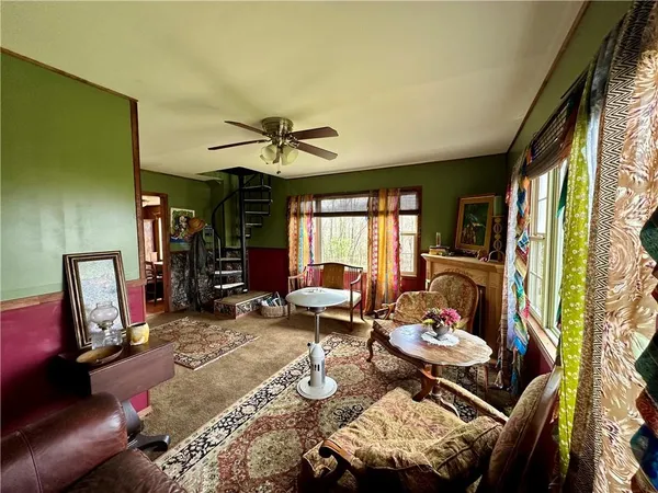 a view of fireplace and window