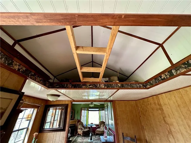 a living room with a couch and a rug