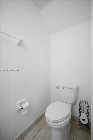 a bathroom with a toilet