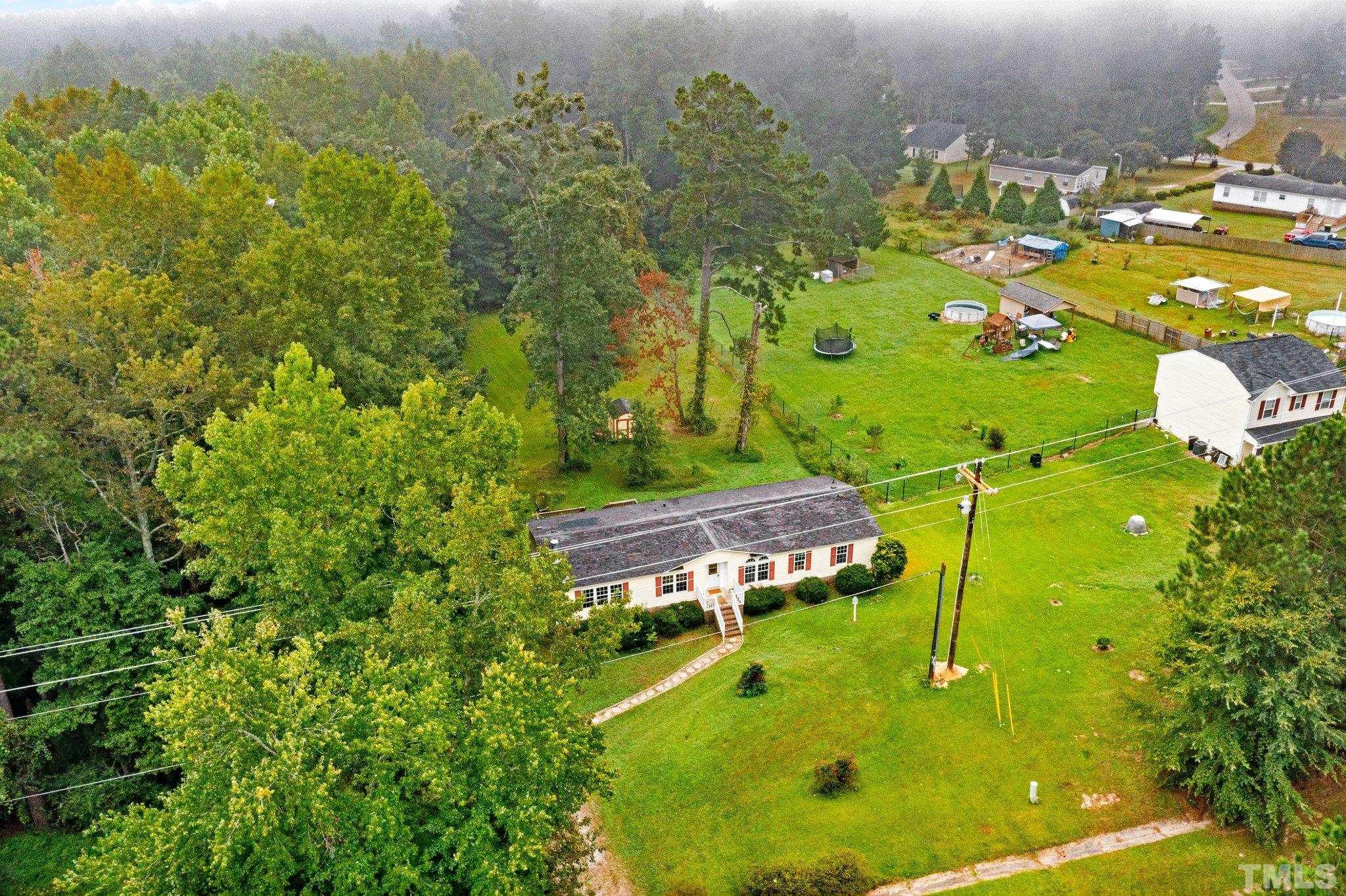 9617 Jernigan Road Spring Hope, NC 27882 - Photo 17 of 41 an aerial view of a residential houses with yard