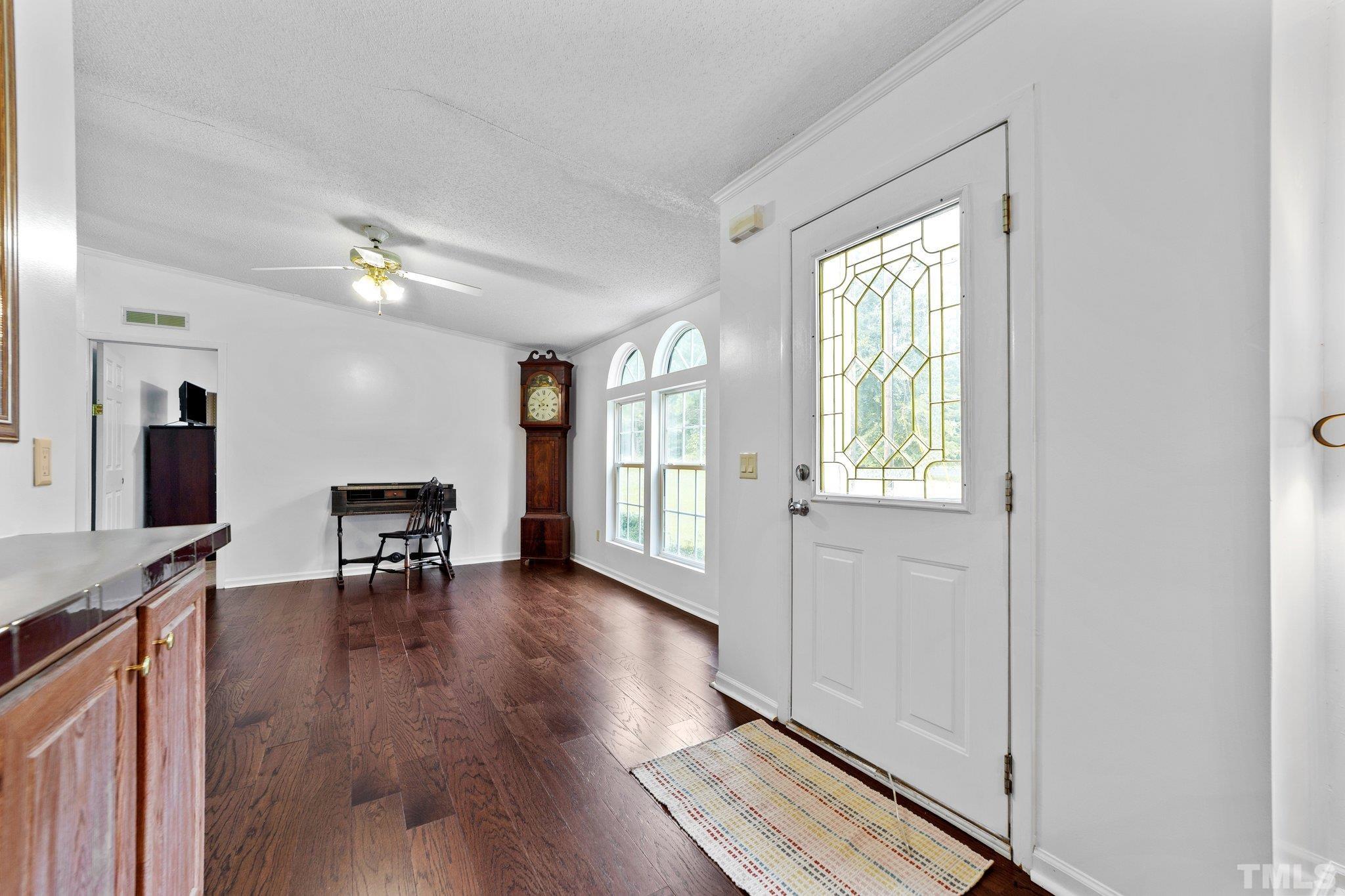 9617 Jernigan Road Spring Hope, NC 27882 - Photo 19 of 41 a view of a livingroom with furniture and a window