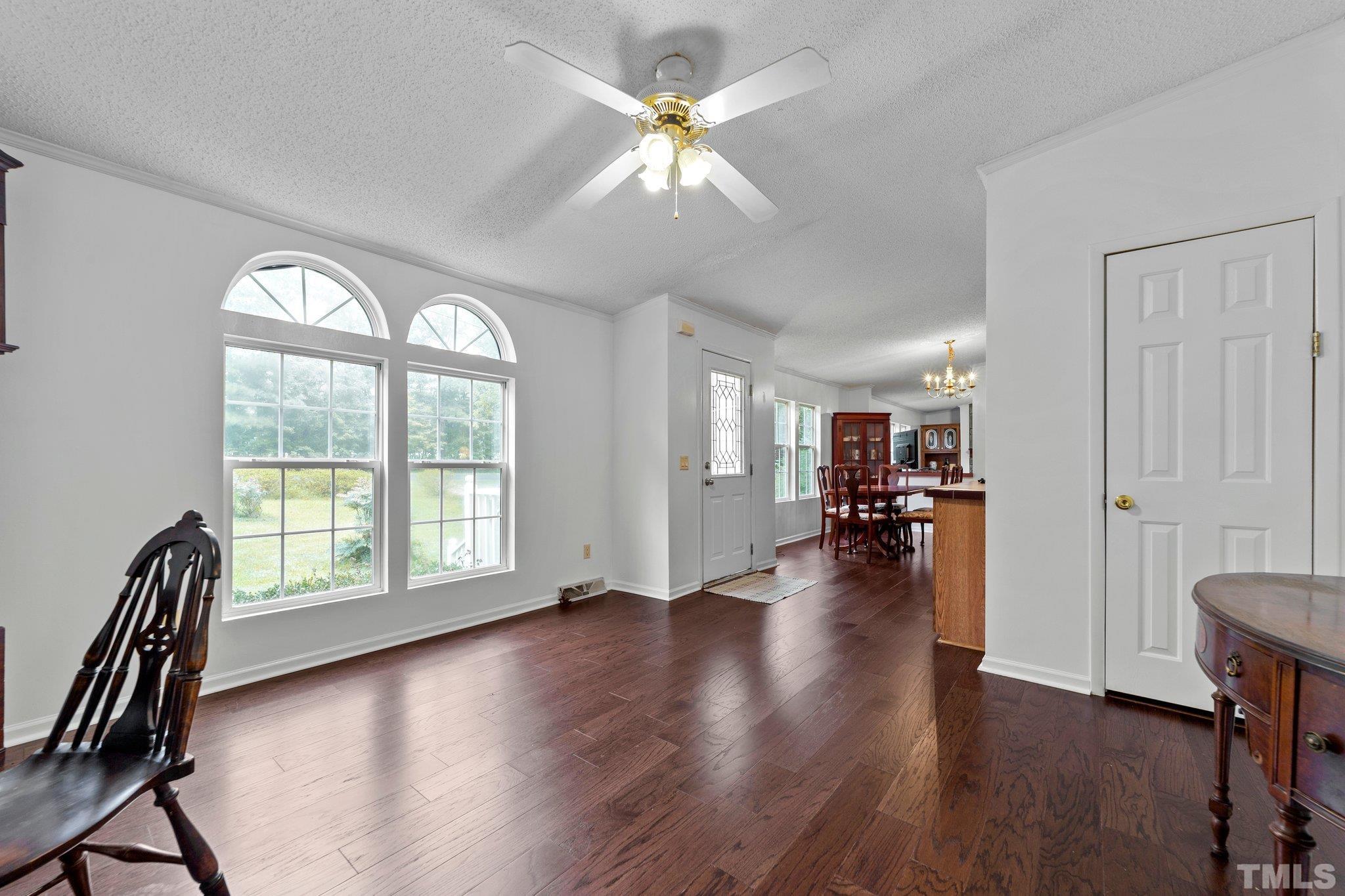 9617 Jernigan Road Spring Hope, NC 27882 - Photo 21 of 41 a view of livingroom with furniture wooden floor and a window