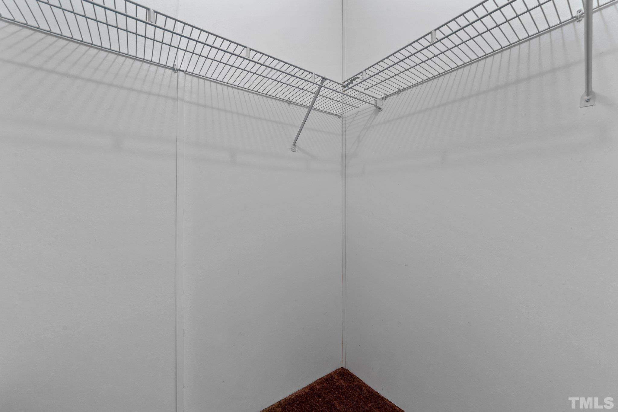 9617 Jernigan Road Spring Hope, NC 27882 - Photo 29 of 41 a view of a room with racks on the wall