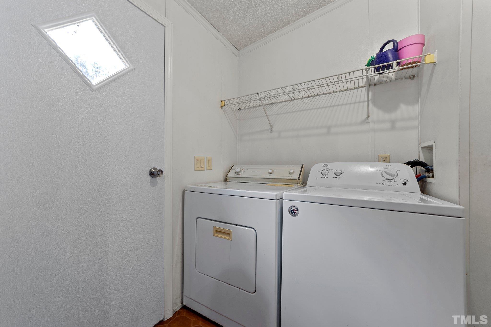 9617 Jernigan Road Spring Hope, NC 27882 - Photo 39 of 41 a utility room with dryer and washer