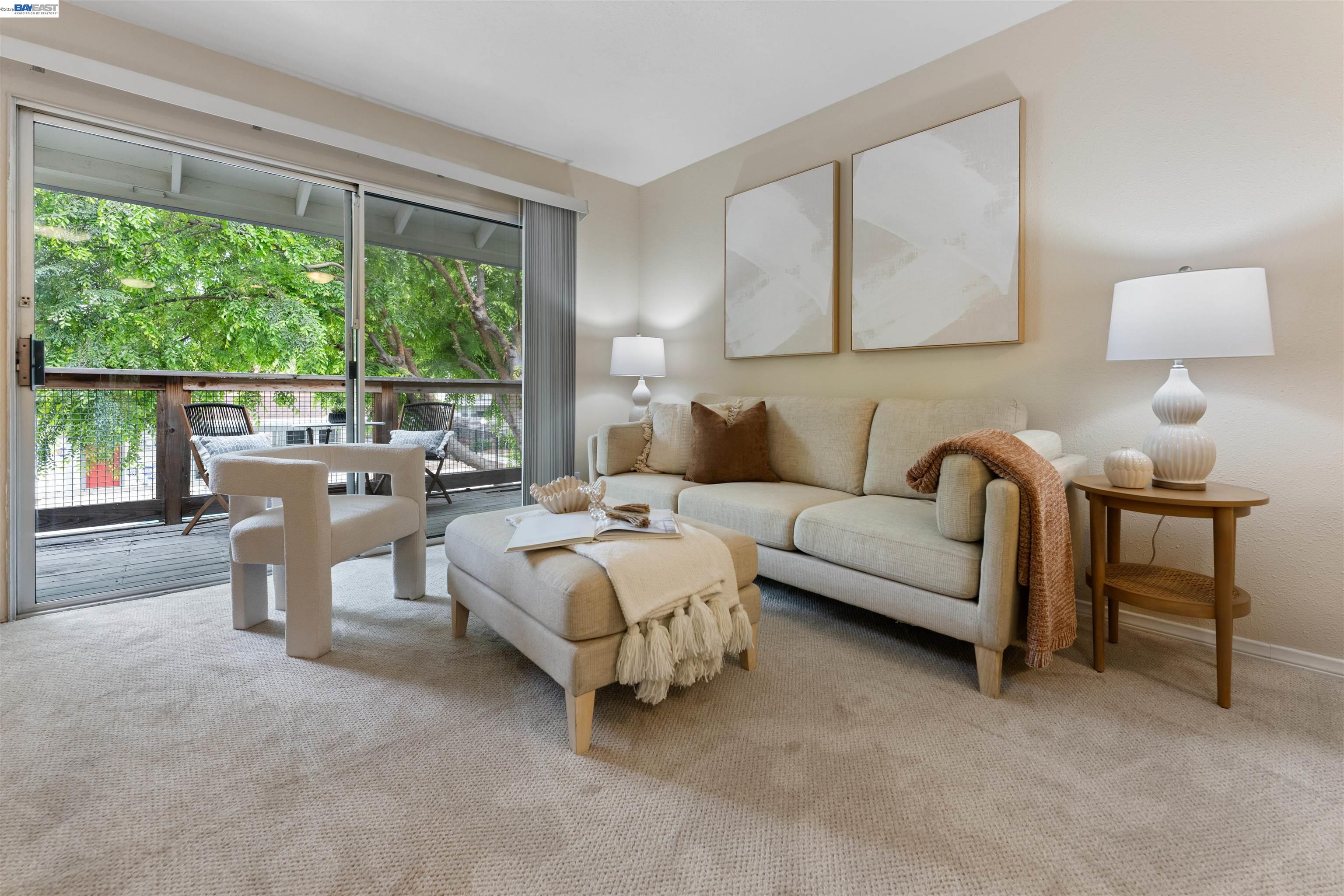 4081 Clayton Road, Unit 221 Concord, CA 94521 - Photo 5 of 23 a living room with furniture and a lamp