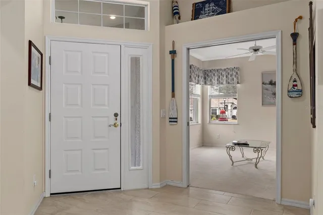 a bedroom with a bed and a mirror