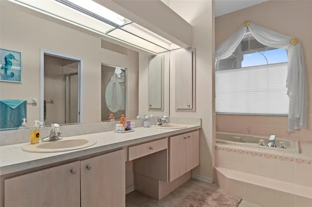 a bathroom with a toilet sink and shower