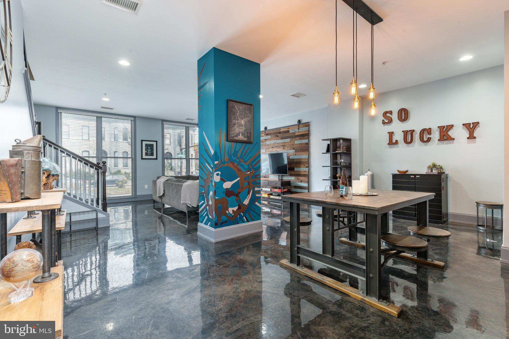 1910 Spring Garden Street, Unit 1 Philadelphia, PA 19130 - Photo 14 of 39 a view of a dining room with furniture
