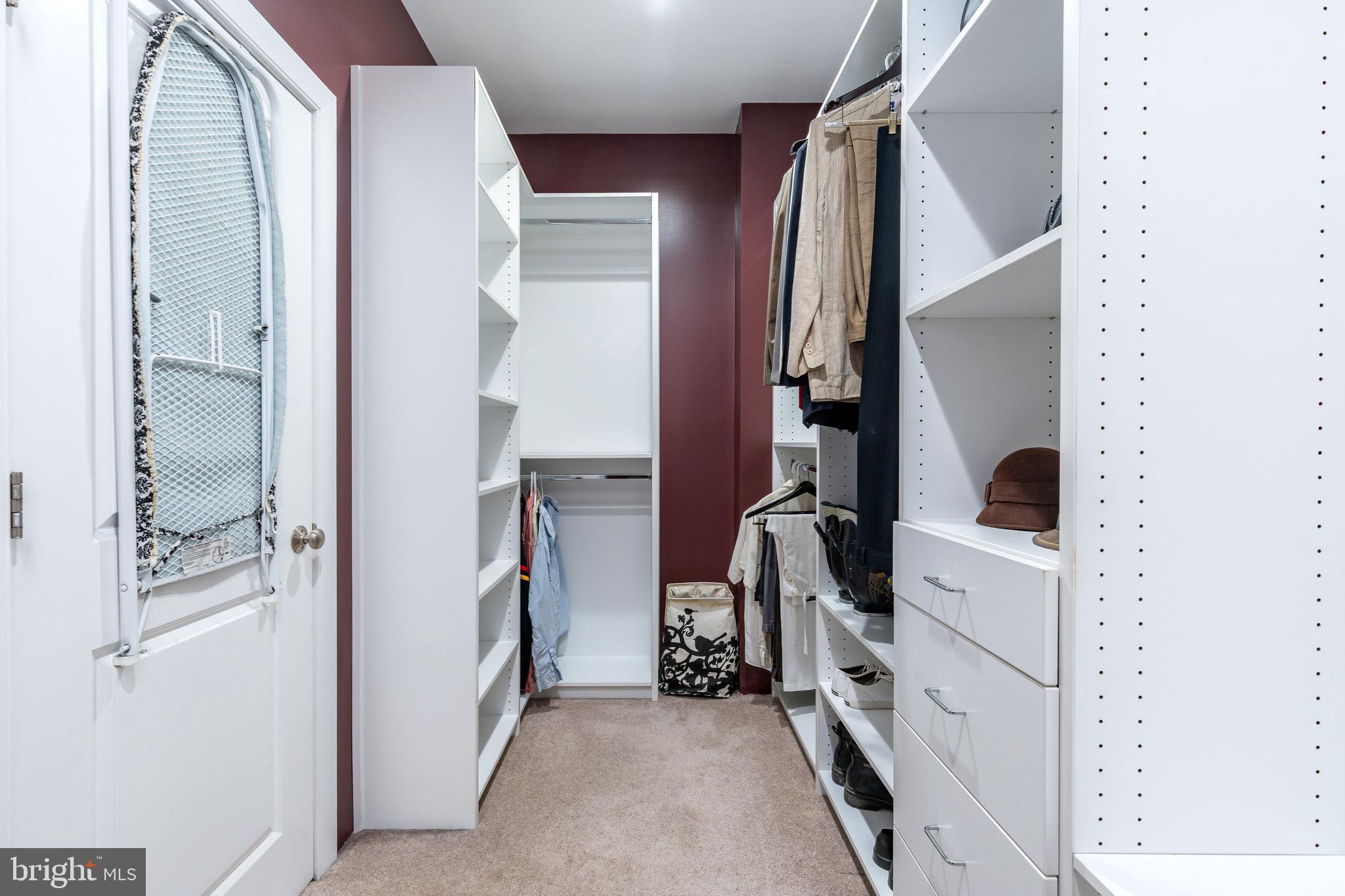 1910 Spring Garden Street, Unit 1 Philadelphia, PA 19130 - Photo 18 of 35 a view of walk in closet with clothes and shoes