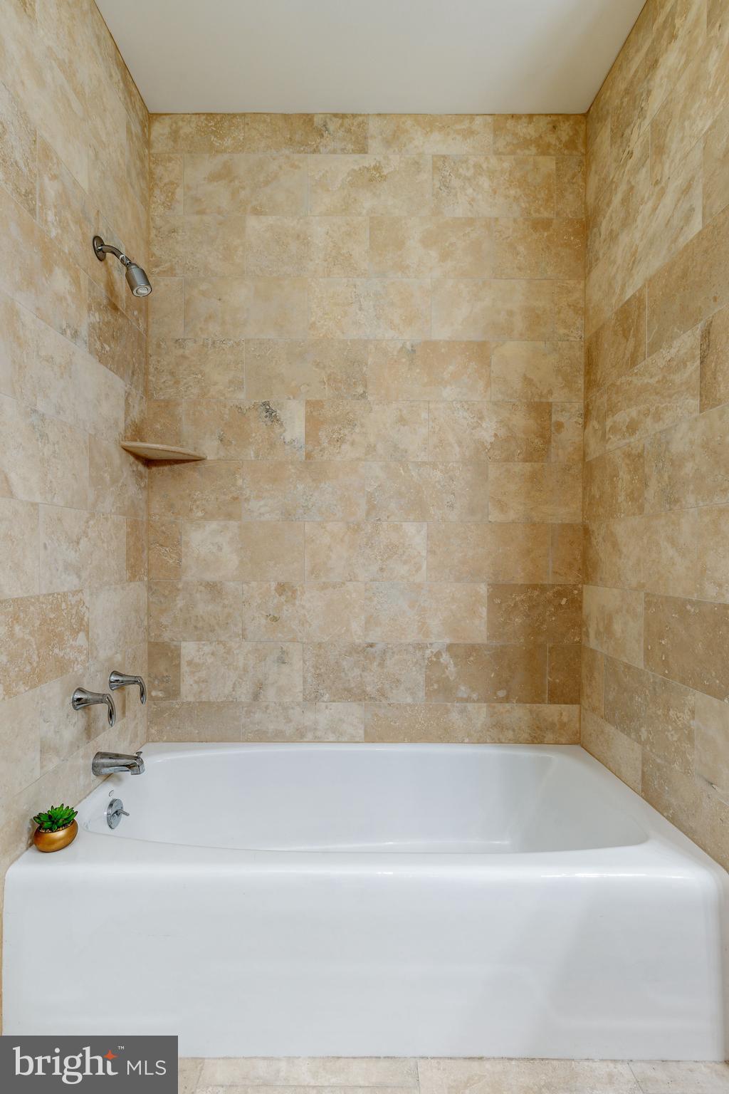 1910 Spring Garden Street, Unit 1 Philadelphia, PA 19130 - Photo 21 of 35 a bathroom with a bathtub