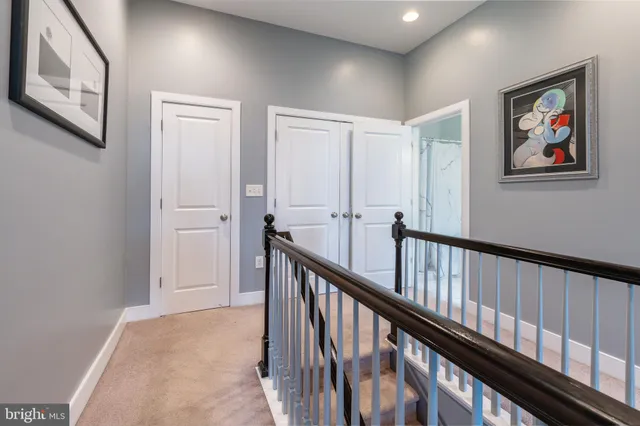 a view of hallway with stairs