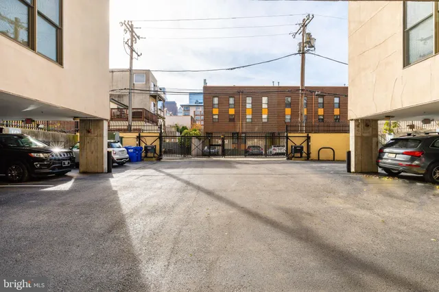 a view of a street with cars