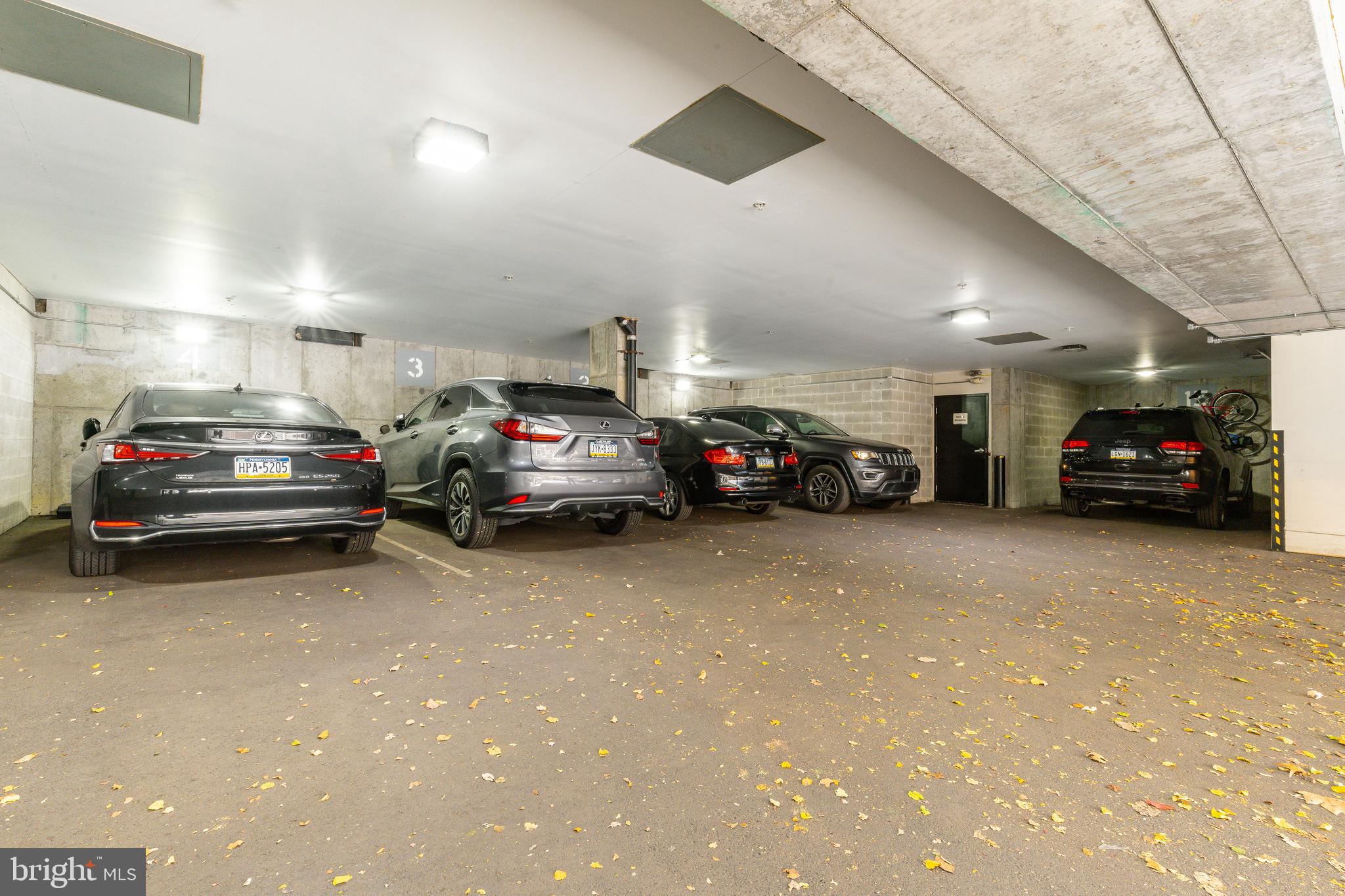 1910 Spring Garden Street, Unit 1 Philadelphia, PA 19130 - Photo 31 of 39 a view of cars parked in a parking