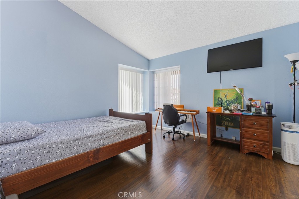700 West Almond Street Compton, CA 90220 - Photo 33 of 68 a bedroom with furniture window and flat screen tv