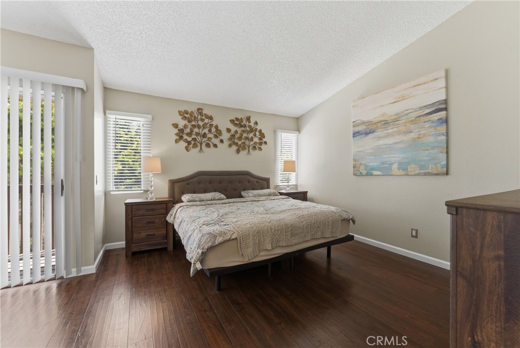 700 West Almond Street Compton, CA 90220 - Photo 43 of 68 a bedroom with a bed and a large window