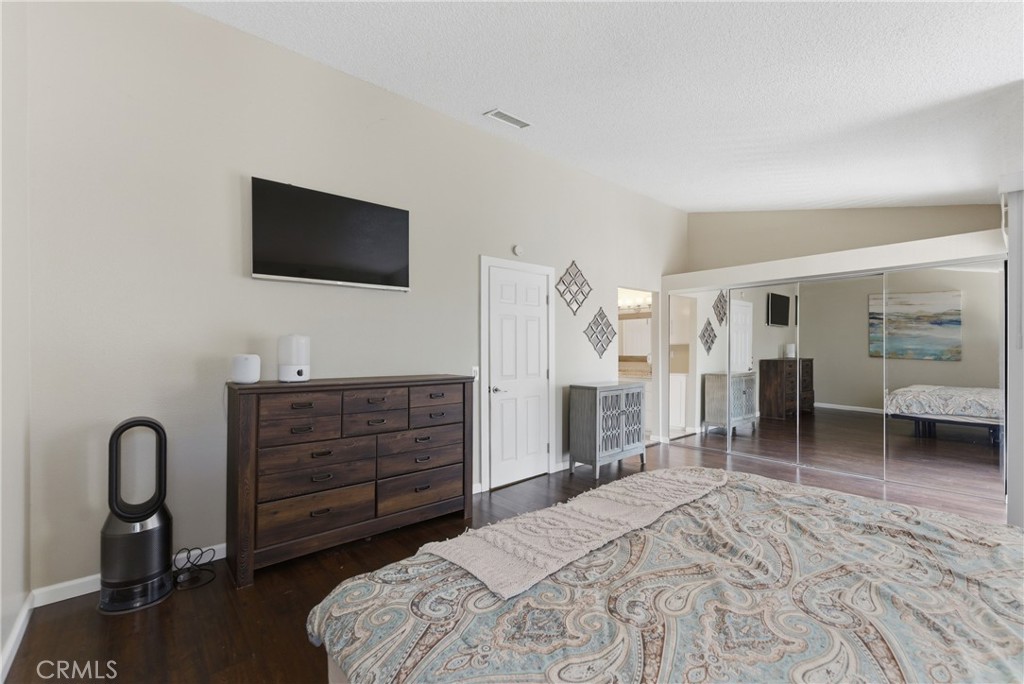 700 West Almond Street Compton, CA 90220 - Photo 46 of 68 a bedroom with a bed and a television