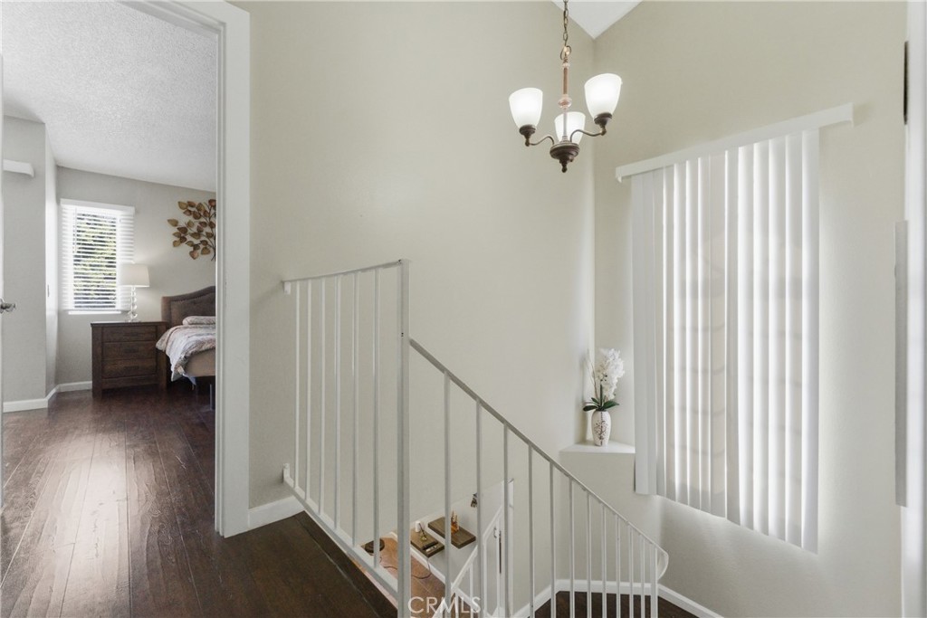 700 West Almond Street Compton, CA 90220 - Photo 53 of 68 a view of a room with wooden floor and stairs