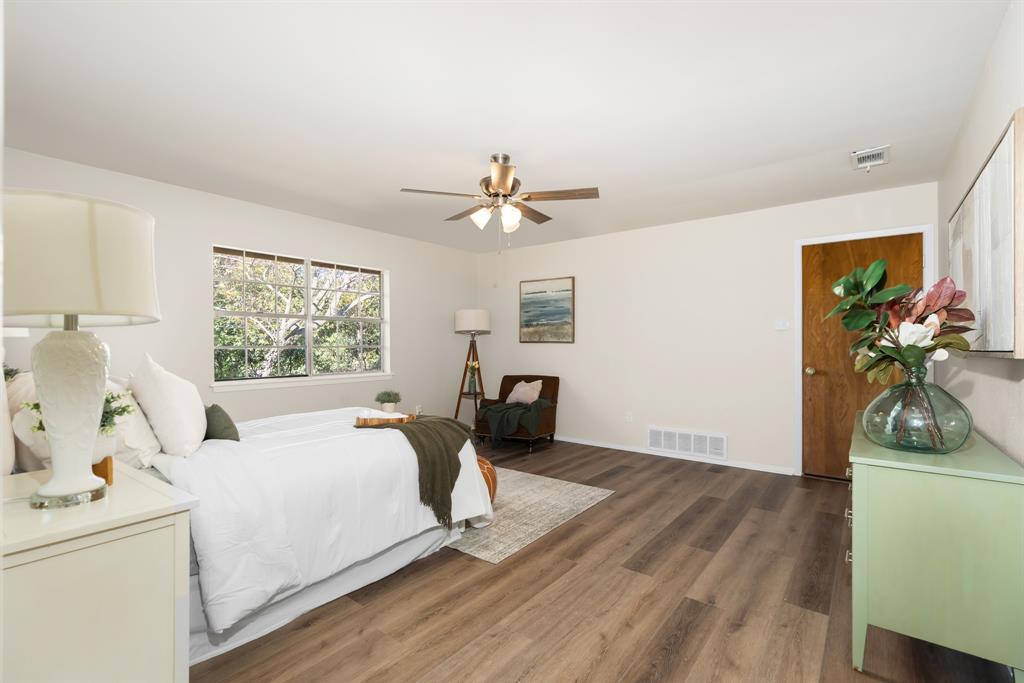 616 South Files Street Itasca, TX 76055 - Photo 16 of 37 a bed room with a bed and a window