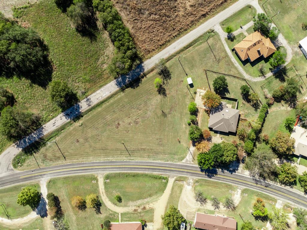 616 South Files Street Itasca, TX 76055 - Photo 36 of 37 an aerial view of a house with a swimming pool
