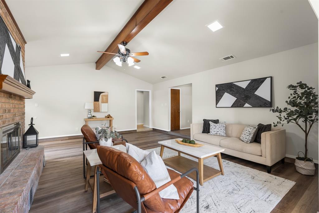 616 South Files Street Itasca, TX 76055 - Photo 10 of 37 a living room with furniture a rug and a table
