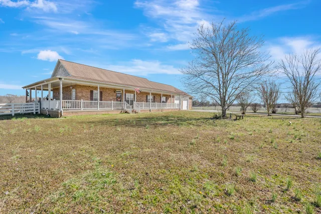 a view of house with outdoor space