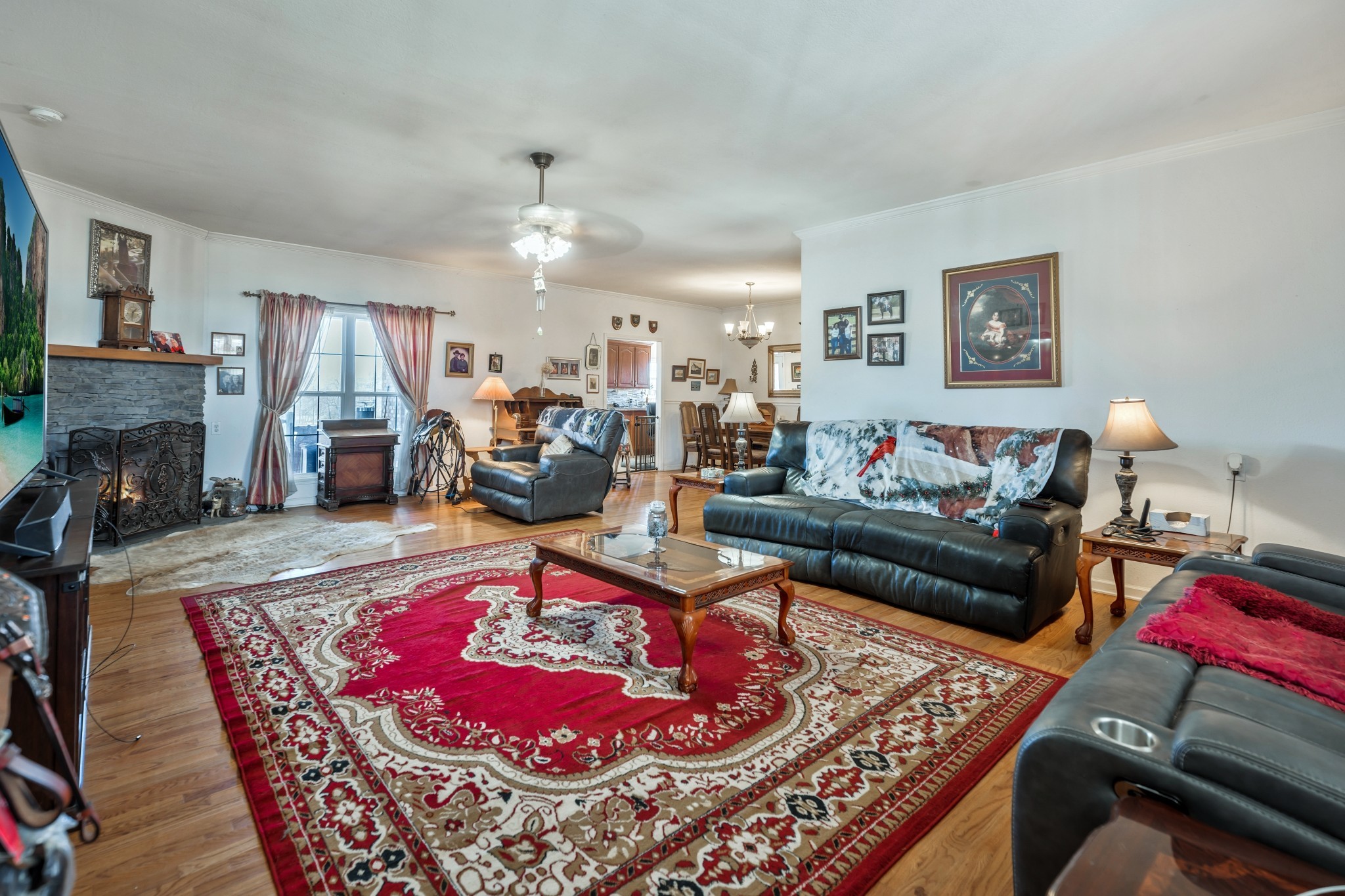 158 Big Springs Road Lawrenceburg, TN 38464 - Photo 23 of 54 a living room with furniture and a fireplace