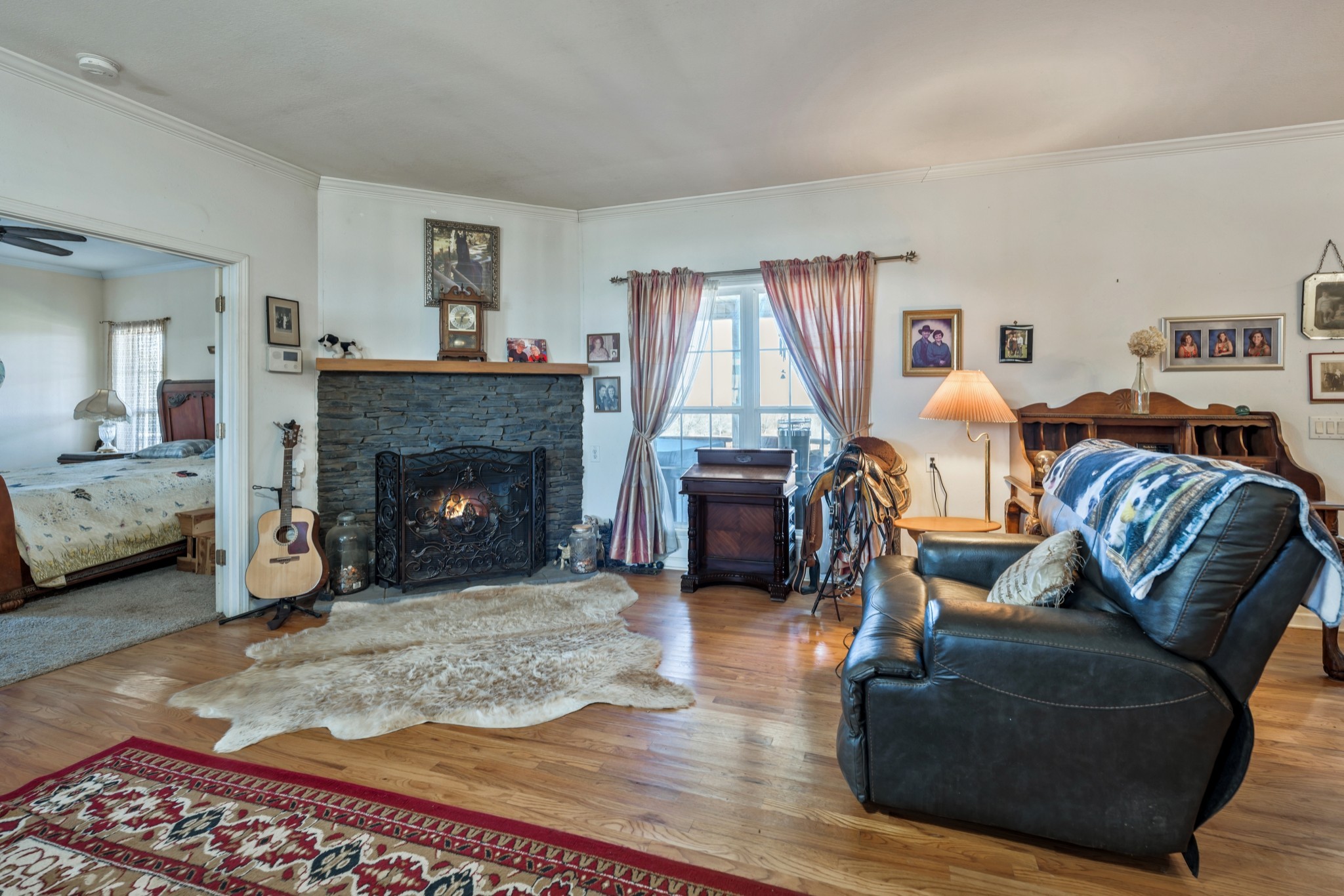 158 Big Springs Road Lawrenceburg, TN 38464 - Photo 24 of 54 a living room with furniture and a fireplace