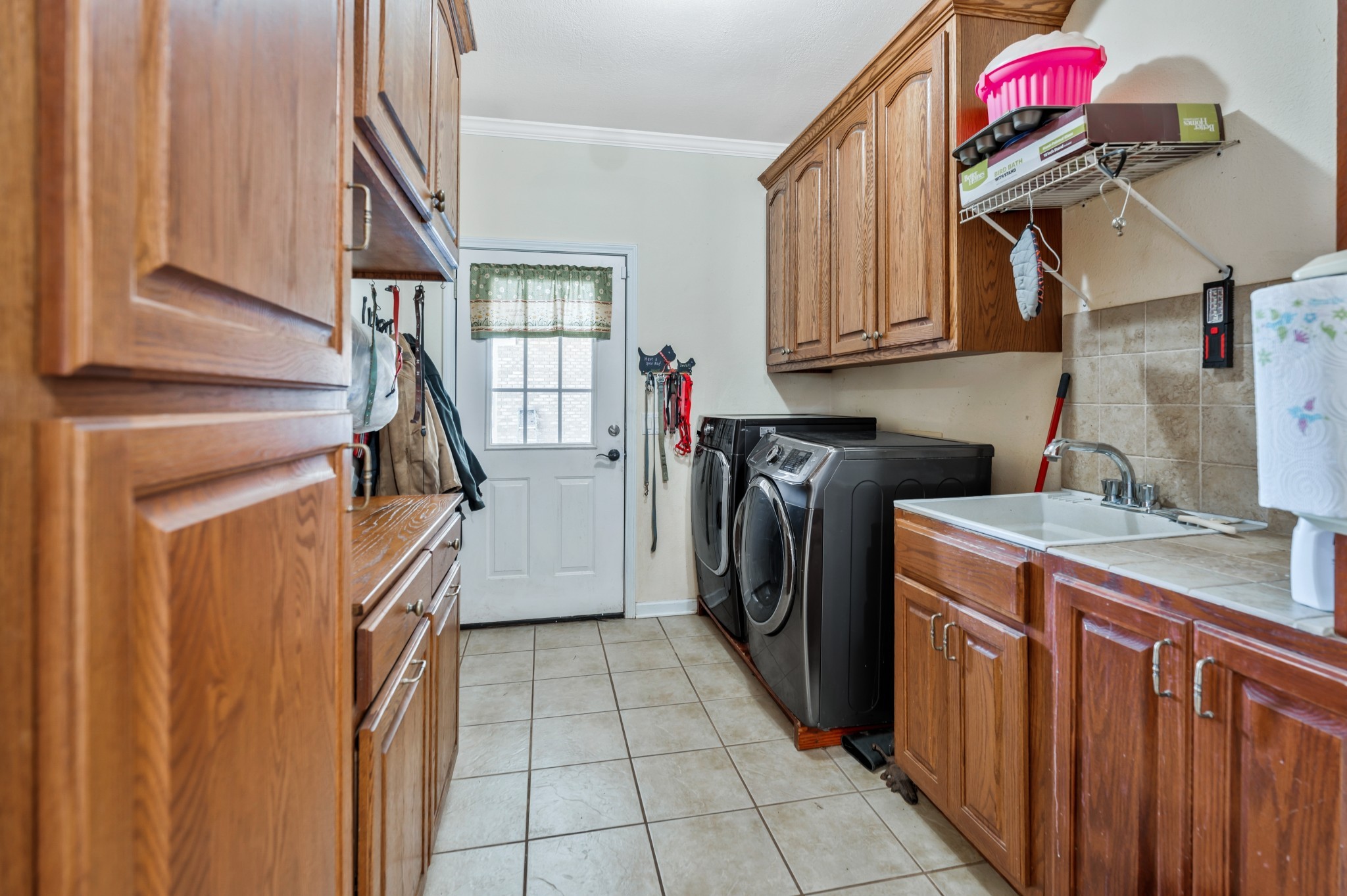 158 Big Springs Road Lawrenceburg, TN 38464 - Photo 31 of 54 a utility room with a sink a washer and dryer