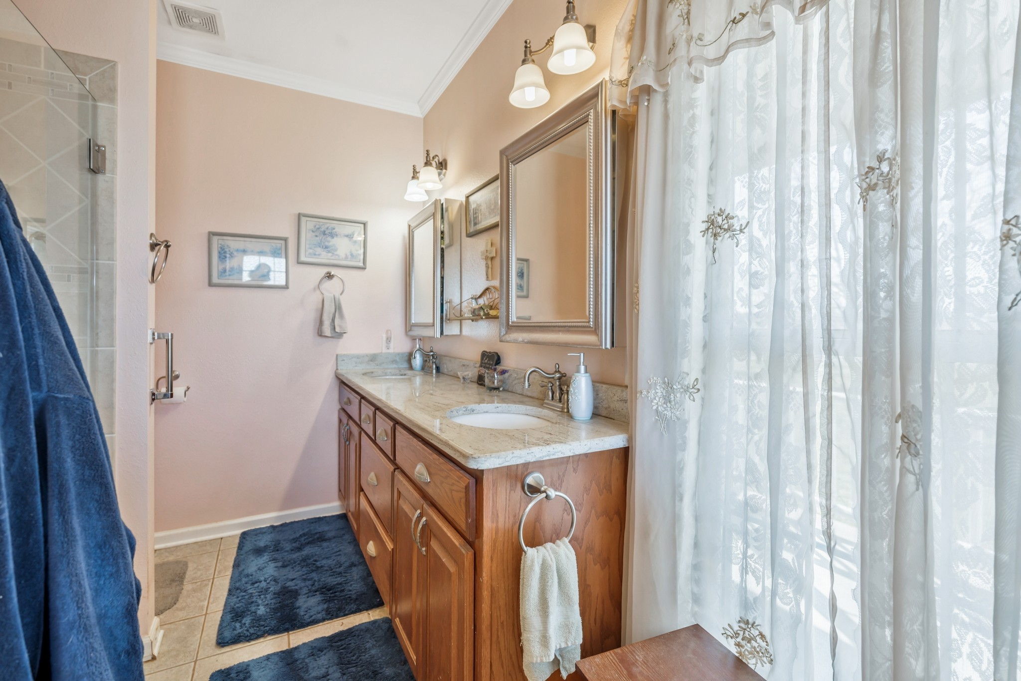 158 Big Springs Road Lawrenceburg, TN 38464 - Photo 35 of 54 a bathroom with a sink a mirror and a shower