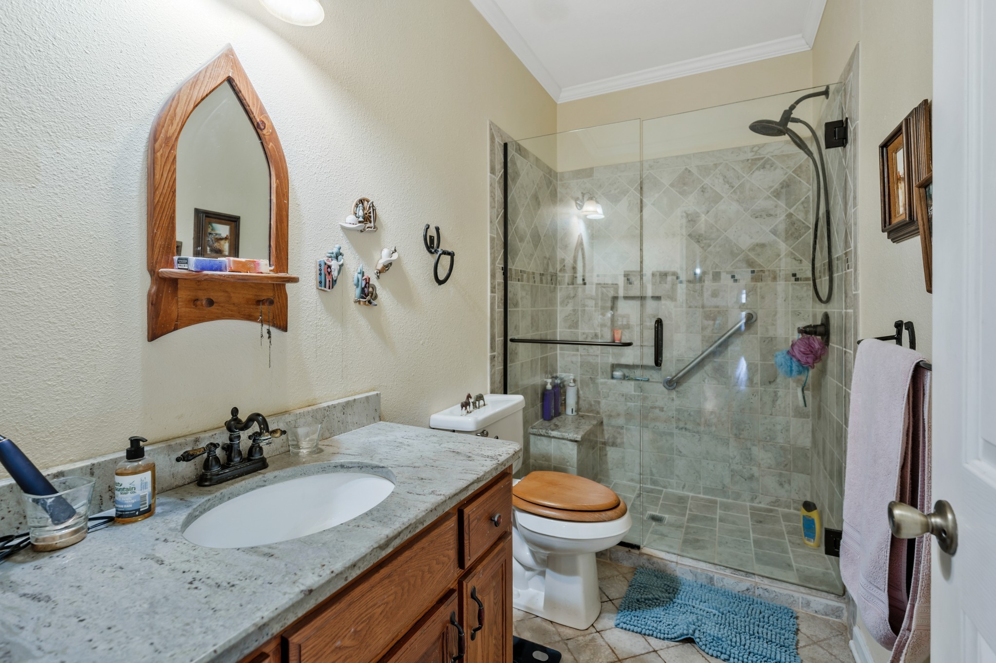 158 Big Springs Road Lawrenceburg, TN 38464 - Photo 42 of 54 a bathroom with a granite countertop sink toilet and shower