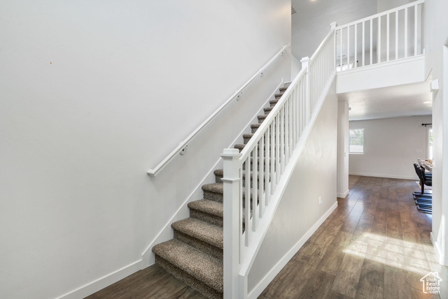 3456 South Linden Way Syracuse, UT 84075 - Photo 6 of 50 Stairs with wood finished floors and baseboards