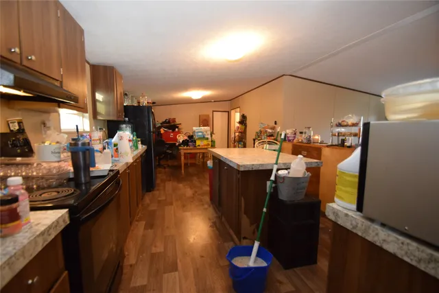 a view of a livingroom with wooden floor