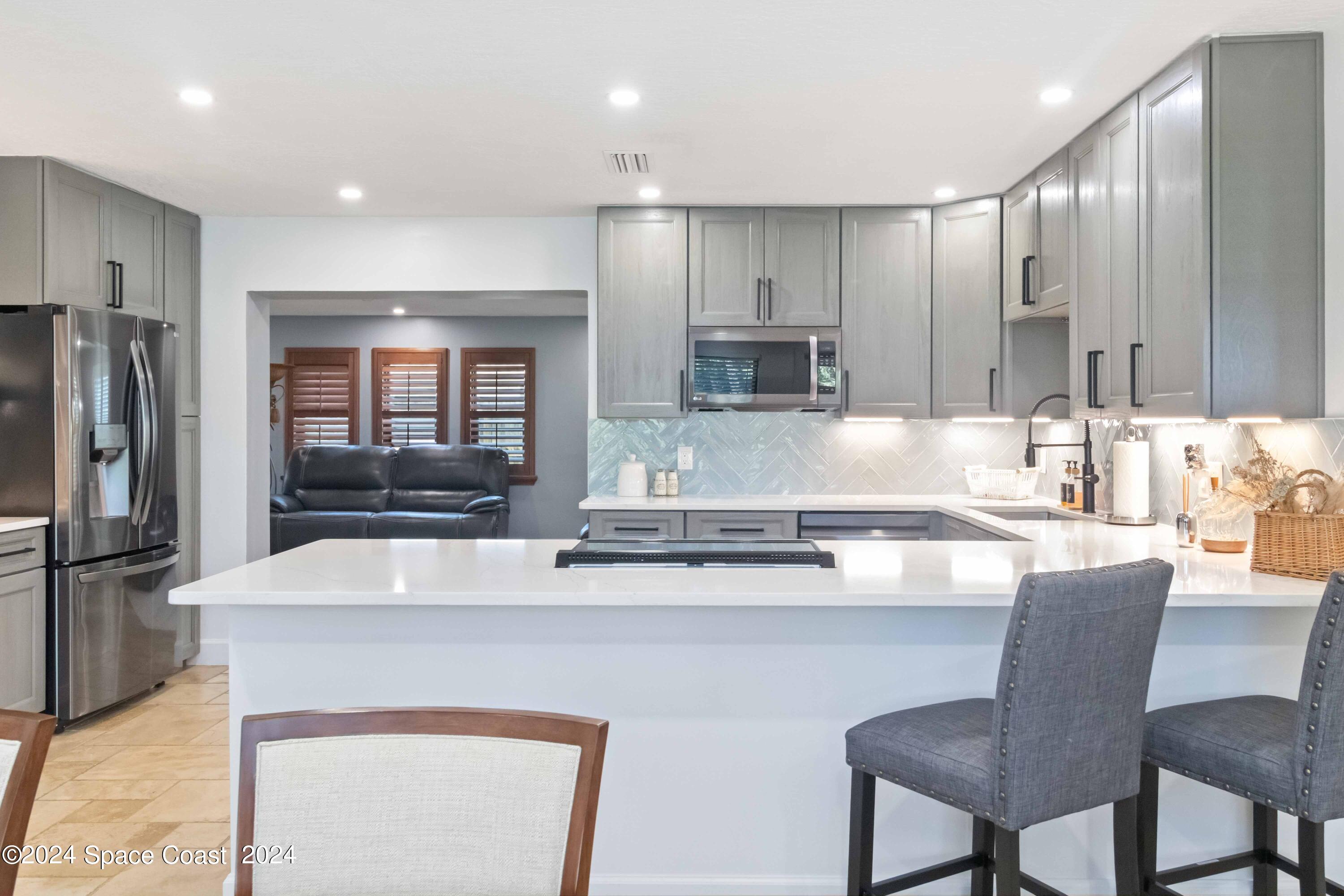 1014 Macco Road Cocoa, FL 32927 - Photo 6 of 28 Quartz Counters, Custom Lighting