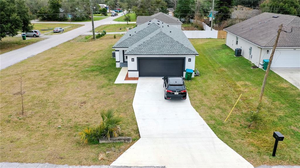 a aerial view of a house having patio
