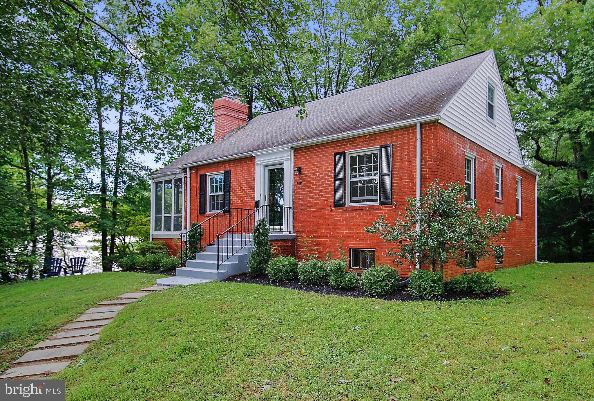 305 Wayne Place Silver Spring, MD 20910 - Photo 1 of 29 a front view of house with yard and green space