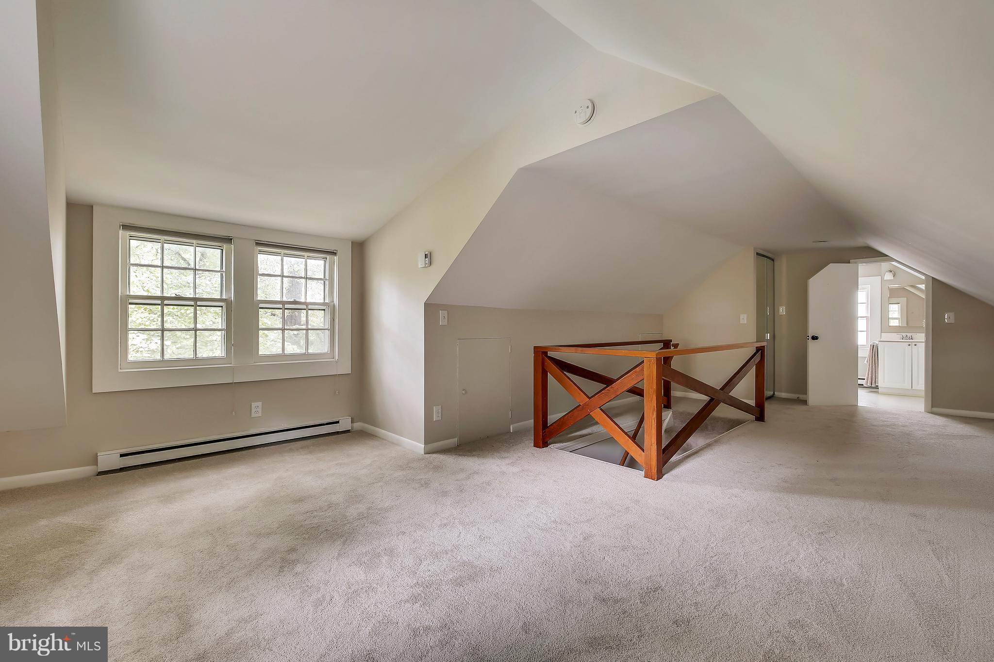 305 Wayne Place Silver Spring, MD 20910 - Photo 17 of 29 a view of an empty room with windows