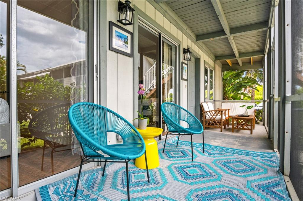 1275 7th Avenue North, Unit 201 Naples, FL 34102 - Photo 29 of 39 View of sunroom / solarium