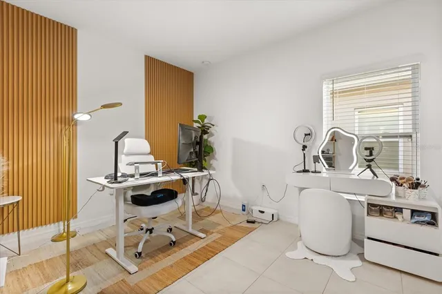 a view of a workspace with furniture