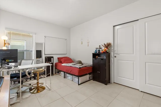 a view of a workspace with furniture