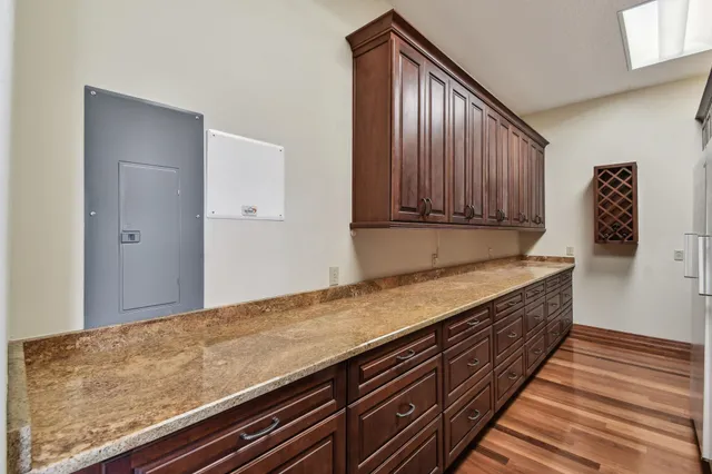 a bathroom with double vanity sinks and a mirror