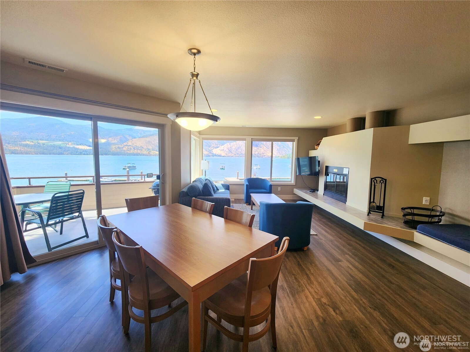 1 Lakeside 720-p Manson, WA 98831 - Photo 1 of 40 a view of a dining room with furniture window and wooden floor