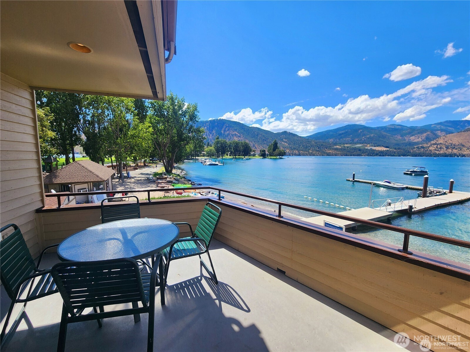 1 Lakeside 720-p Manson, WA 98831 - Photo 2 of 40 a view of a chairs and table in patio with a backyard