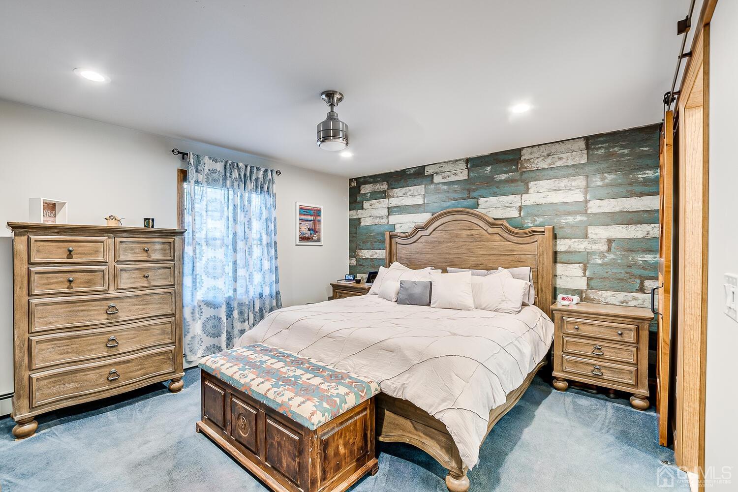 91 South Hill Road Colonia, NJ 07067 - Photo 25 of 46 a bedroom with a bed and a dresser