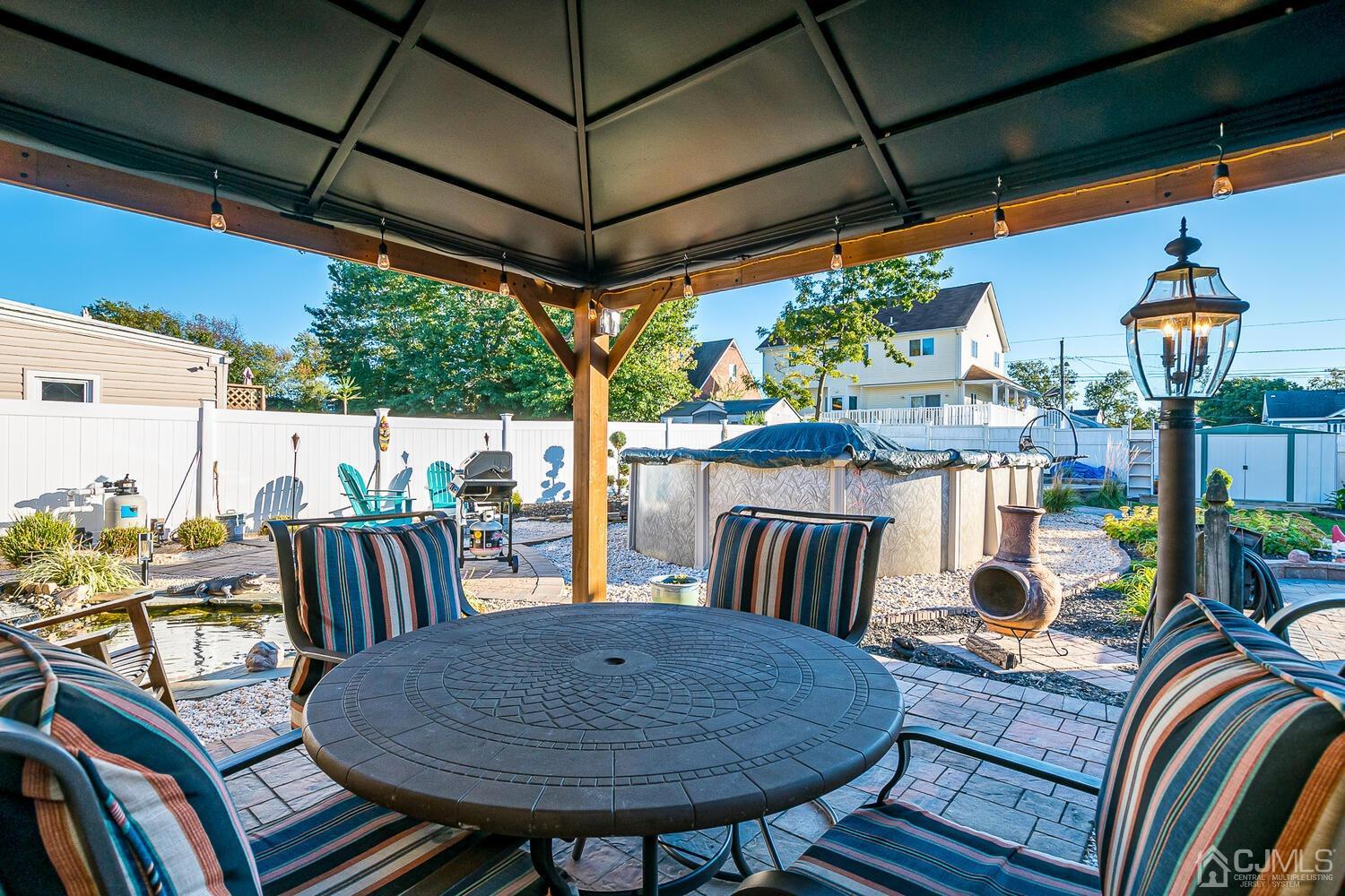 91 South Hill Road Colonia, NJ 07067 - Photo 41 of 46 a view of balcony with furniture and outdoor seating