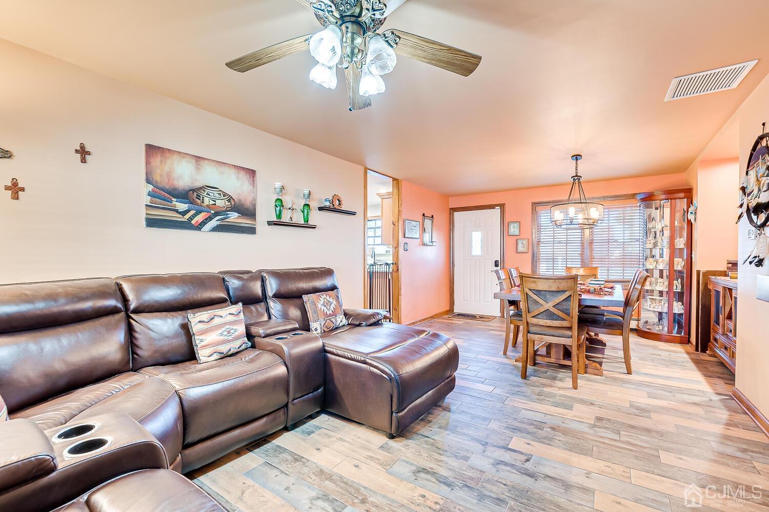 91 South Hill Road Colonia, NJ 07067 - Photo 6 of 46 a living room with furniture and a large window