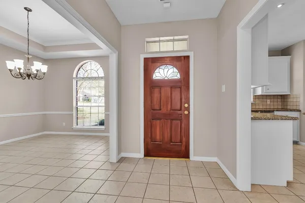 a view of an entryway with a window